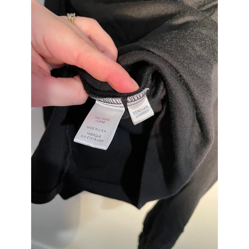 Diane von Furstenberg Black Wool Turtleneck‎ Ruffle Hem Top Size 10 Quiet Luxury